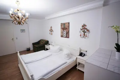 Ein Bett oder Betten in einem Zimmer der Unterkunft Hotel Seibel