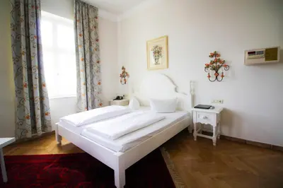 Ein Bett oder Betten in einem Zimmer der Unterkunft Hotel Seibel