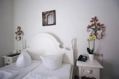 Ein Bett oder Betten in einem Zimmer der Unterkunft Hotel Seibel