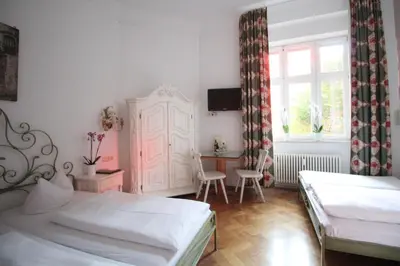 Ein Bett oder Betten in einem Zimmer der Unterkunft Hotel Seibel