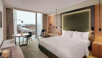 Ein Bett oder Betten in einem Zimmer der Unterkunft Hilton Munich Airport