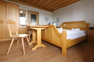 Ein Bett oder Betten in einem Zimmer der Unterkunft Hotel Neuwirt