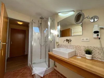 Ein Badezimmer in der Unterkunft Hotel Garni Brunnthaler