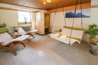 Ein Sitzbereich in der Unterkunft Hotel Garni Brunnthaler