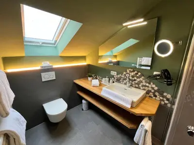Ein Badezimmer in der Unterkunft Hotel Garni Brunnthaler