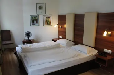 Ein Bett oder Betten in einem Zimmer der Unterkunft Hotel am Viktualienmarkt