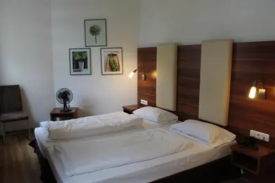 Ein Bett oder Betten in einem Zimmer der Unterkunft Hotel am Viktualienmarkt