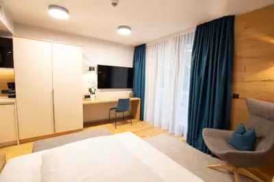 Ein Bett oder Betten in einem Zimmer der Unterkunft Leo Apartments Miesbach