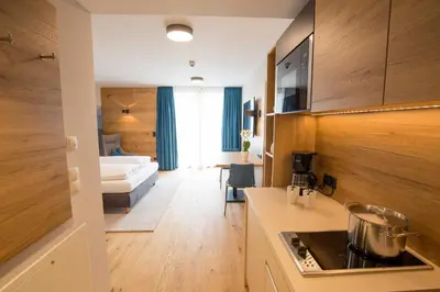 Ein Bett oder Betten in einem Zimmer der Unterkunft Leo Apartments Miesbach