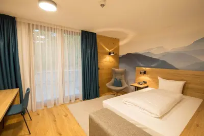 Ein Bett oder Betten in einem Zimmer der Unterkunft Leo Apartments Miesbach