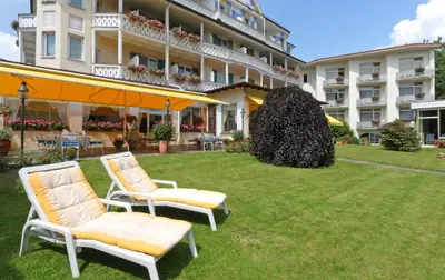 Ein Garten an der Unterkunft Wittelsbacher Hof Swiss Quality Hotel