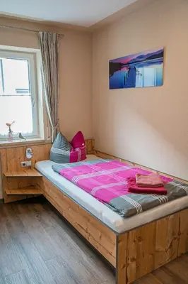 Ein Bett oder Betten in einem Zimmer der Unterkunft Pension Sengmüller
