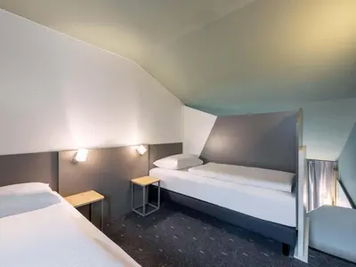 Ein Bett oder Betten in einem Zimmer der Unterkunft B&B Hotel Ingolstadt-Ost