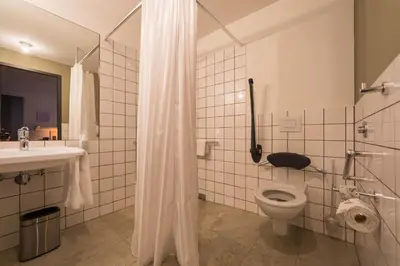 Ein Badezimmer in der Unterkunft Hotel einsmehr