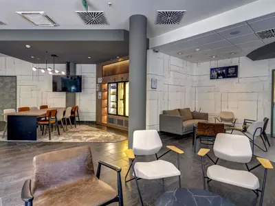 Ein Sitzbereich in der Unterkunft Novotel Suites München Parkstadt Schwabing