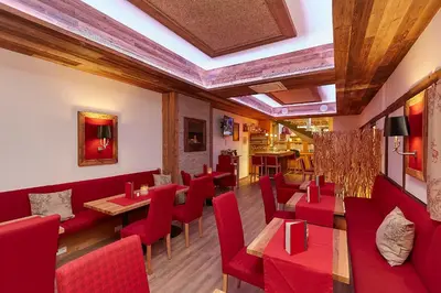 Ein Sitzbereich in der Unterkunft Hotel Am Kamin