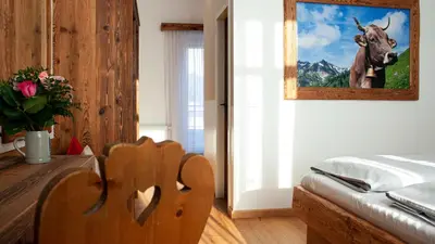 Ein Bett oder Betten in einem Zimmer der Unterkunft Hotel Almwirt