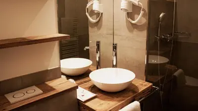 Ein Badezimmer in der Unterkunft Hotel Almwirt