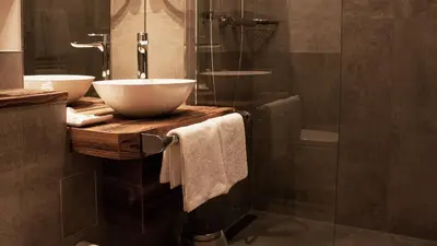 Ein Badezimmer in der Unterkunft Hotel Almwirt