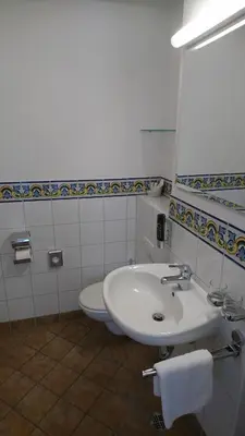 Ein Badezimmer in der Unterkunft Hotel Henry