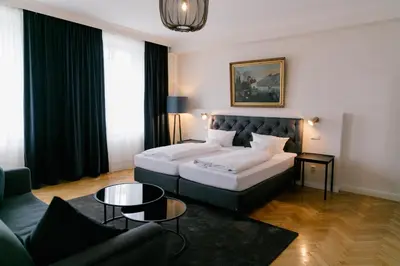 Ein Bett oder Betten in einem Zimmer der Unterkunft Hotel Fletzinger