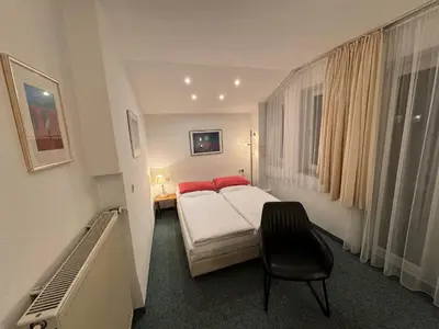 Ein Bett oder Betten in einem Zimmer der Unterkunft Hotel Occam