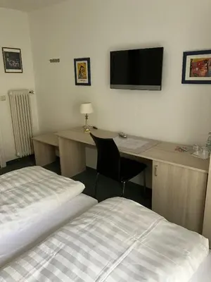 Ein Bett oder Betten in einem Zimmer der Unterkunft Hotel Occam