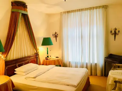 Ein Bett oder Betten in einem Zimmer der Unterkunft Hotel Opera