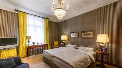 Ein Bett oder Betten in einem Zimmer der Unterkunft Hotel Opera