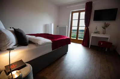Ein Bett oder Betten in einem Zimmer der Unterkunft Landgasthof Hittenkirchen