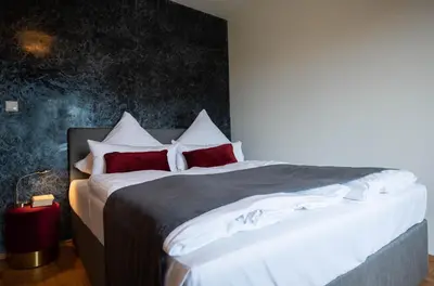 Ein Bett oder Betten in einem Zimmer der Unterkunft Landgasthof Hittenkirchen