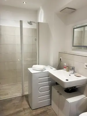 Ein Badezimmer in der Unterkunft Landgasthof Hittenkirchen