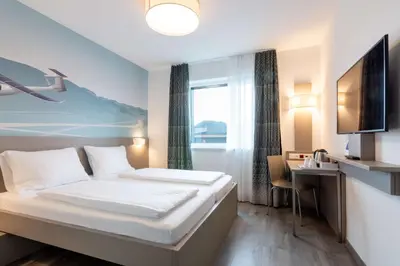 Ein Bett oder Betten in einem Zimmer der Unterkunft Best Western Hotel Kiefersfelden