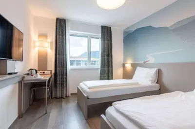 Ein Bett oder Betten in einem Zimmer der Unterkunft Best Western Hotel Kiefersfelden