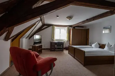 Ein Bett oder Betten in einem Zimmer der Unterkunft Bistro-Pension Vis-a-Vis