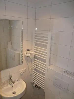 Ein Badezimmer in der Unterkunft Hotel Edelweiß
