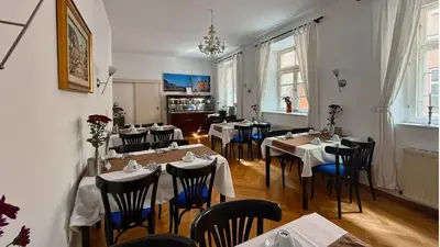 Ein Restaurant oder anderes Speiselokal in der Unterkunft Altstadthotel Augsburg