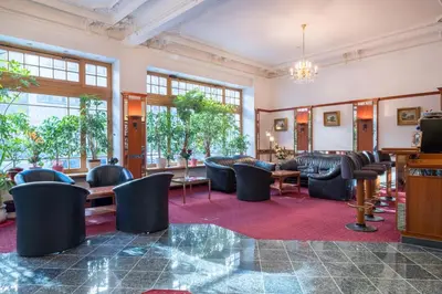 Ein Sitzbereich in der Unterkunft Hotel Bayernland