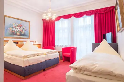 Ein Bett oder Betten in einem Zimmer der Unterkunft Hotel Bayernland