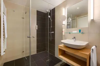 Ein Badezimmer in der Unterkunft Wyndham Garden Munich Messe