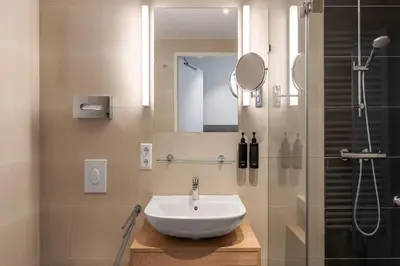 Ein Badezimmer in der Unterkunft Wyndham Garden Munich Messe