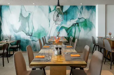Ein Restaurant oder anderes Speiselokal in der Unterkunft Wyndham Garden Munich Messe