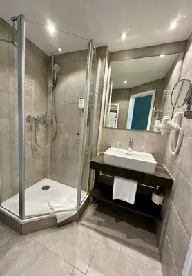Ein Badezimmer in der Unterkunft Hotel Säntis