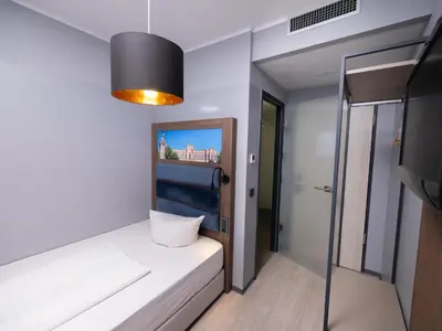 Ein Bett oder Betten in einem Zimmer der Unterkunft Smart Stay Hotel Station