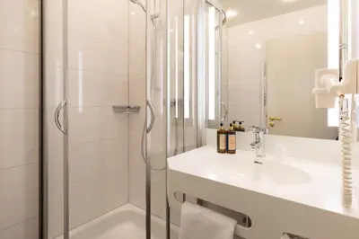 Ein Badezimmer in der Unterkunft Landhotel Restaurant Huberhof Allershausen