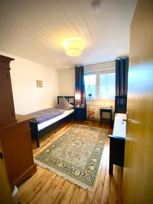 Ein Bett oder Betten in einem Zimmer der Unterkunft Ferienwohnung