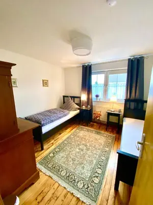 Ein Bett oder Betten in einem Zimmer der Unterkunft Ferienwohnung