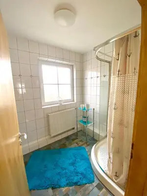 Ein Badezimmer in der Unterkunft Ferienwohnung