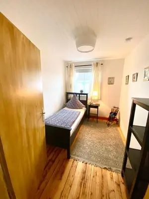Ein Bett oder Betten in einem Zimmer der Unterkunft Ferienwohnung