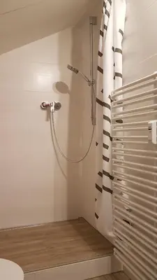 Ein Badezimmer in der Unterkunft Kleine gemütliche Mansardenwohnung im Südosten Münchens